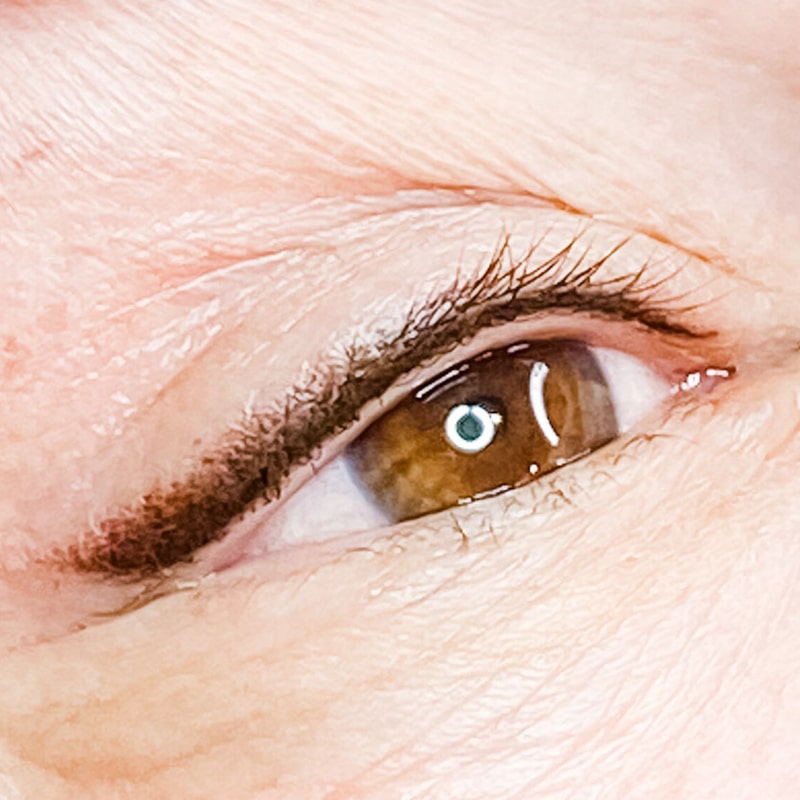 a close up of a persons eyes